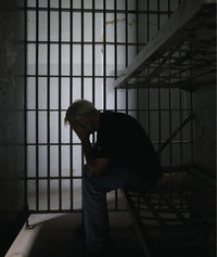 Gefangener - Gefangener in einer Zelle
